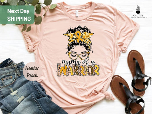 Mama Of A Warrior Shirt, Leopard Messy Bun Shirt, I Wear Gold For Childhood Cancer Awareness Shirt